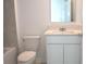 Clean bathroom with single vanity, shower/tub combo, and toilet at 2343 Amorie Dr, Kissimmee, FL 34746