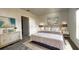 Spacious bedroom with plush bedding, elegant decor, and large windows at 2343 Amorie Dr, Kissimmee, FL 34746