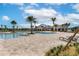 Resort-style pool with lounge chairs and palm trees at 2343 Amorie Dr, Kissimmee, FL 34746
