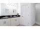 Modern bathroom with double vanity, granite countertops, and a separate shower at 476 Lake Shore Pkwy, Davenport, FL 33896