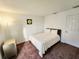 Bright bedroom with a comfortable bed at 612 Bloomingdale Dr, Davenport, FL 33897