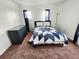 Bedroom with a double bed and dresser at 612 Bloomingdale Dr, Davenport, FL 33897