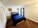Main bedroom with a queen bed and nightstands at 612 Bloomingdale Dr, Davenport, FL 33897