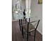 Small breakfast nook with glass table and two chairs, perfect for casual meals at 612 Bloomingdale Dr, Davenport, FL 33897