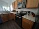 Modern kitchen with stainless steel appliances at 612 Bloomingdale Dr, Davenport, FL 33897