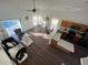 Open living room with kitchen and pool view at 612 Bloomingdale Dr, Davenport, FL 33897