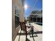 Relaxing pool area with screened enclosure and patio furniture at 612 Bloomingdale Dr, Davenport, FL 33897
