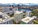 High-rise building overlooking cityscape and lake at 100 S Eola Dr # 1411, Orlando, FL 32801