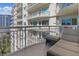 Relaxing balcony with city views and outdoor seating at 100 S Eola Dr # 1411, Orlando, FL 32801