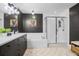 Spa-like bathroom with a soaking tub, walk-in shower, and modern vanity at 100 S Eola Dr # 1411, Orlando, FL 32801