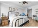 Spacious bedroom with hardwood floors and a modern bed frame at 100 S Eola Dr # 1411, Orlando, FL 32801
