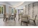 Bright breakfast nook with tables and chairs at 100 S Eola Dr # 1411, Orlando, FL 32801