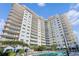 Luxury high-rise building with pool and patio area at 100 S Eola Dr # 1411, Orlando, FL 32801