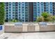 Outdoor grilling station with stainless steel appliances at 100 S Eola Dr # 1411, Orlando, FL 32801