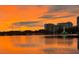 Stunning sunset over Lake Eola, reflecting city lights at 100 S Eola Dr # 1411, Orlando, FL 32801