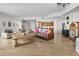Spacious living room with hardwood floors and large windows at 100 S Eola Dr # 1411, Orlando, FL 32801