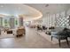 Spacious lobby with ample seating and large windows at 100 S Eola Dr # 1411, Orlando, FL 32801