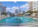 Large, refreshing pool with plenty of lounge chairs and cabanas at 100 S Eola Dr # 1411, Orlando, FL 32801