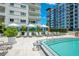 Relaxing pool area with shaded cabanas and lounge chairs at 100 S Eola Dr # 1411, Orlando, FL 32801