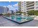 Stunning pool area with city views and multiple cabanas at 100 S Eola Dr # 1411, Orlando, FL 32801