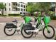 Lime electric scooters parked on a city street near apartment building at 100 S Eola Dr # 1411, Orlando, FL 32801