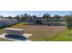 Community playground with playset, swings, and benches at 1251 Citrus Landing Blvd, Davenport, FL 33837
