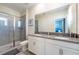 Bathroom with double sinks and a walk-in shower at 2759 Bookmark Dr, Kissimmee, FL 34746