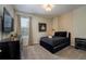 Bedroom with a Mickey Mouse themed wall and a queen bed at 2759 Bookmark Dr, Kissimmee, FL 34746