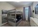 Bedroom with a bunk bed and gray-toned decor at 2759 Bookmark Dr, Kissimmee, FL 34746