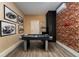 Game room featuring air hockey and classic car art at 2759 Bookmark Dr, Kissimmee, FL 34746