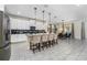 Modern kitchen with white cabinets, gray countertops, and island at 2759 Bookmark Dr, Kissimmee, FL 34746