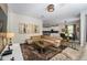 Spacious living area with sectional sofa, coffee table, and open floor plan at 2759 Bookmark Dr, Kissimmee, FL 34746