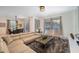 Large living room with comfortable seating and access to backyard at 2759 Bookmark Dr, Kissimmee, FL 34746