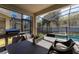 Relaxing screened-in patio with pool, hot tub, and outdoor dining area at 2759 Bookmark Dr, Kissimmee, FL 34746