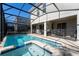 Sparkling pool and spa, perfect for relaxation, screened in for privacy at 2759 Bookmark Dr, Kissimmee, FL 34746
