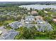 Aerial view of community featuring lakefront location and townhomes at 2920 Oak Park Way # Apt A, Orlando, FL 32822