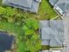 Aerial view of home showcasing the backyard, landscaping and lake view at 2920 Oak Park Way # Apt A, Orlando, FL 32822