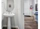 Small bathroom with pedestal sink at 2920 Oak Park Way # Apt A, Orlando, FL 32822