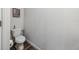 Small bathroom with toilet and wall art at 2920 Oak Park Way # Apt A, Orlando, FL 32822