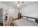 Bedroom with queen bed and view of living area at 2920 Oak Park Way # Apt A, Orlando, FL 32822