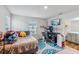 Spacious bedroom featuring a comfortable bed and workspace at 2920 Oak Park Way # Apt A, Orlando, FL 32822