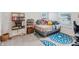 Bright bedroom with plush carpet and built-in shelving at 2920 Oak Park Way # Apt A, Orlando, FL 32822
