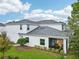 White two story home with gray roof and screened lanai at 2920 Oak Park Way # Apt A, Orlando, FL 32822