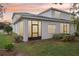 Rear view of home with screened patio and landscaping at 2920 Oak Park Way # Apt A, Orlando, FL 32822