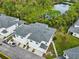 Aerial view of a modern townhouse with a private backyard at 2920 Oak Park Way # Apt A, Orlando, FL 32822