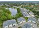 Community of townhouses with lake views and lush landscaping at 2920 Oak Park Way # Apt A, Orlando, FL 32822
