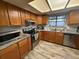 Modern kitchen with stainless steel appliances and granite countertops at 311 Alpine St, Altamonte Springs, FL 32701