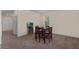 Bright dining area with table and chairs, adjacent to kitchen at 5613 New Independence Pkwy, Winter Garden, FL 34787