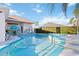 Relaxing pool and spa with patio furniture at 10642 Cloudview Dr, Orlando, FL 32825