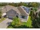 Property features solar panels and a spacious backyard at 12079 Alder Branch Loop, Orlando, FL 32824